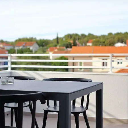 Appartement L *